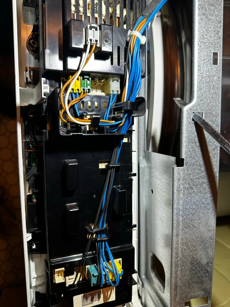 Control module and wiring inside a Bosch laundry appliance