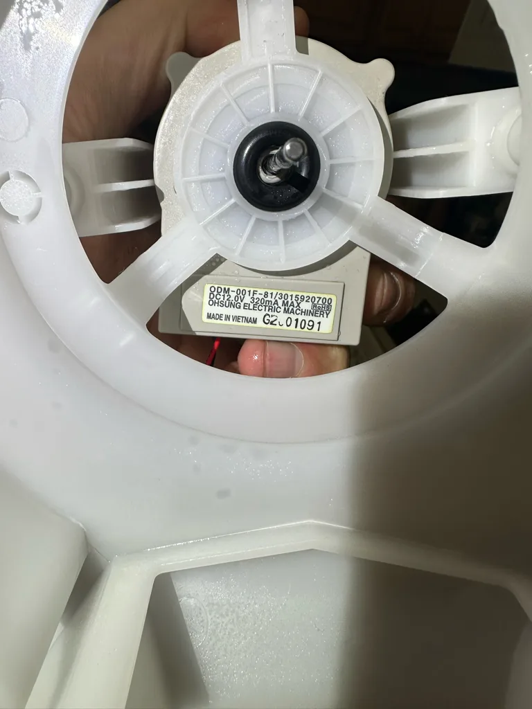 Evaporator fan motor inside a Bosch refrigerator