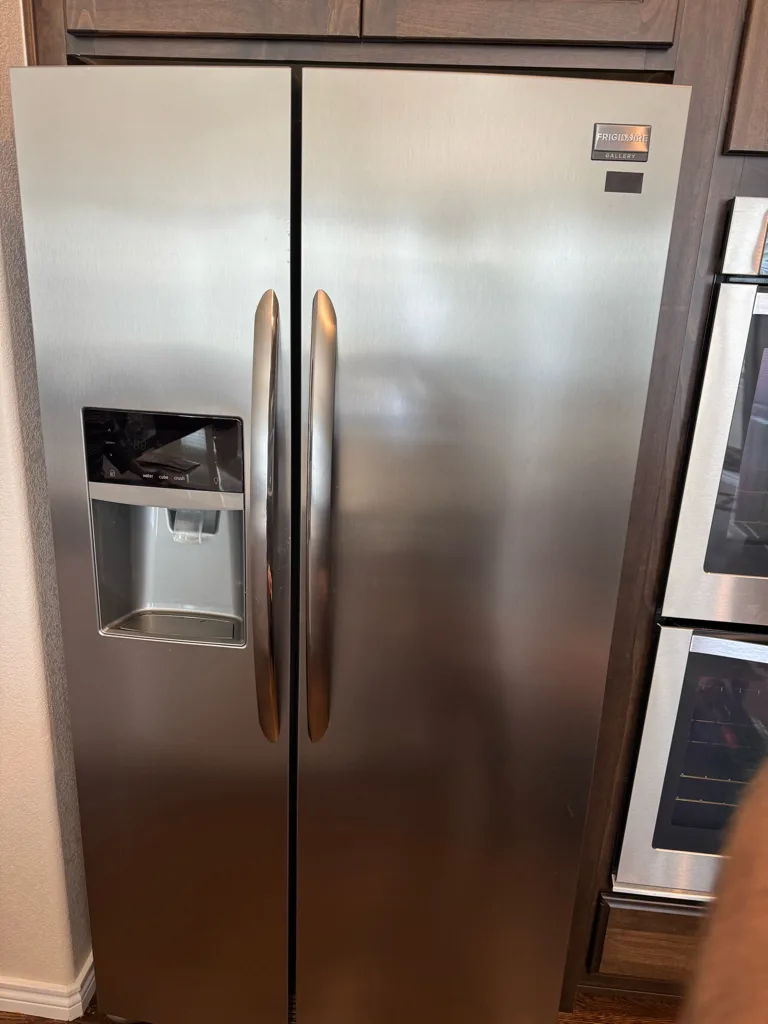 Stainless steel Frigidaire Gallery side-by-side refrigerator in a Denver-area kitchen