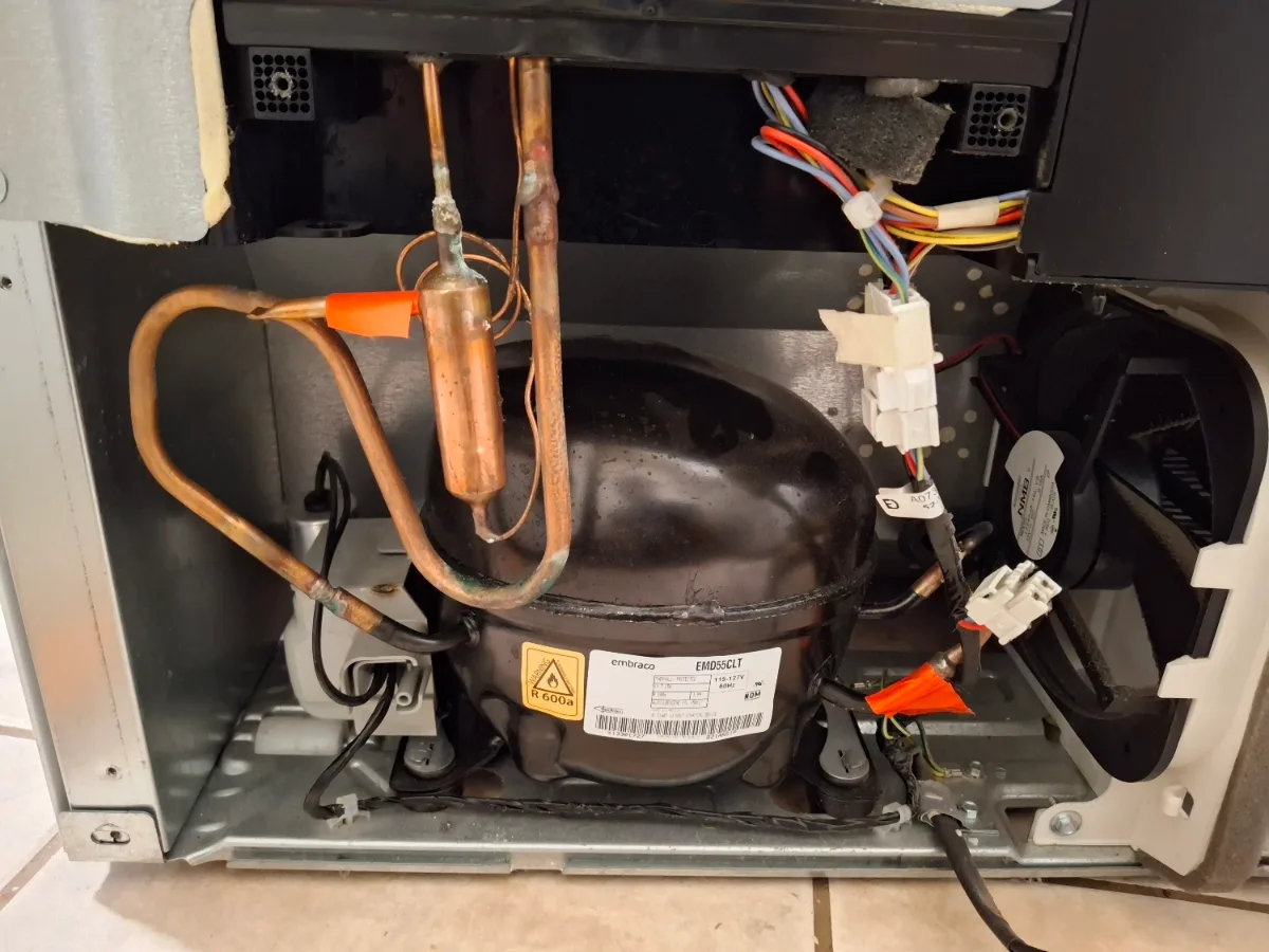 Compressor compartment of a Frigidaire refrigerator that was not cooling