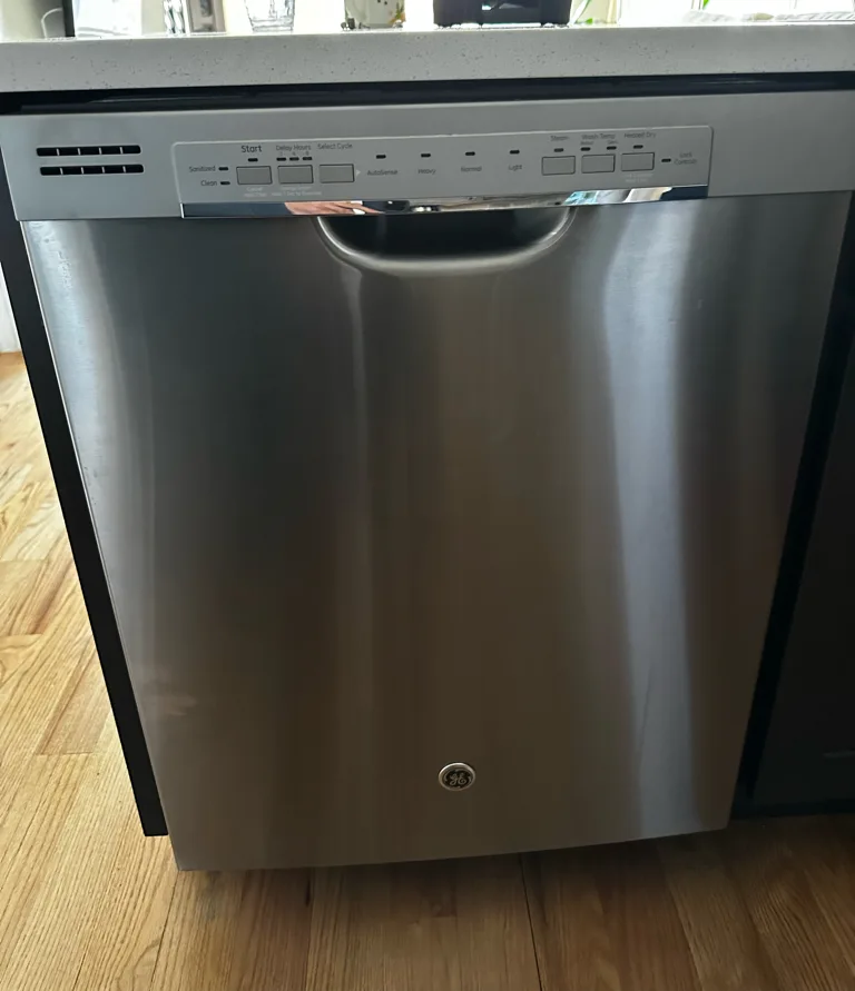 Stainless steel GE built-in dishwasher in a Denver-area kitchen