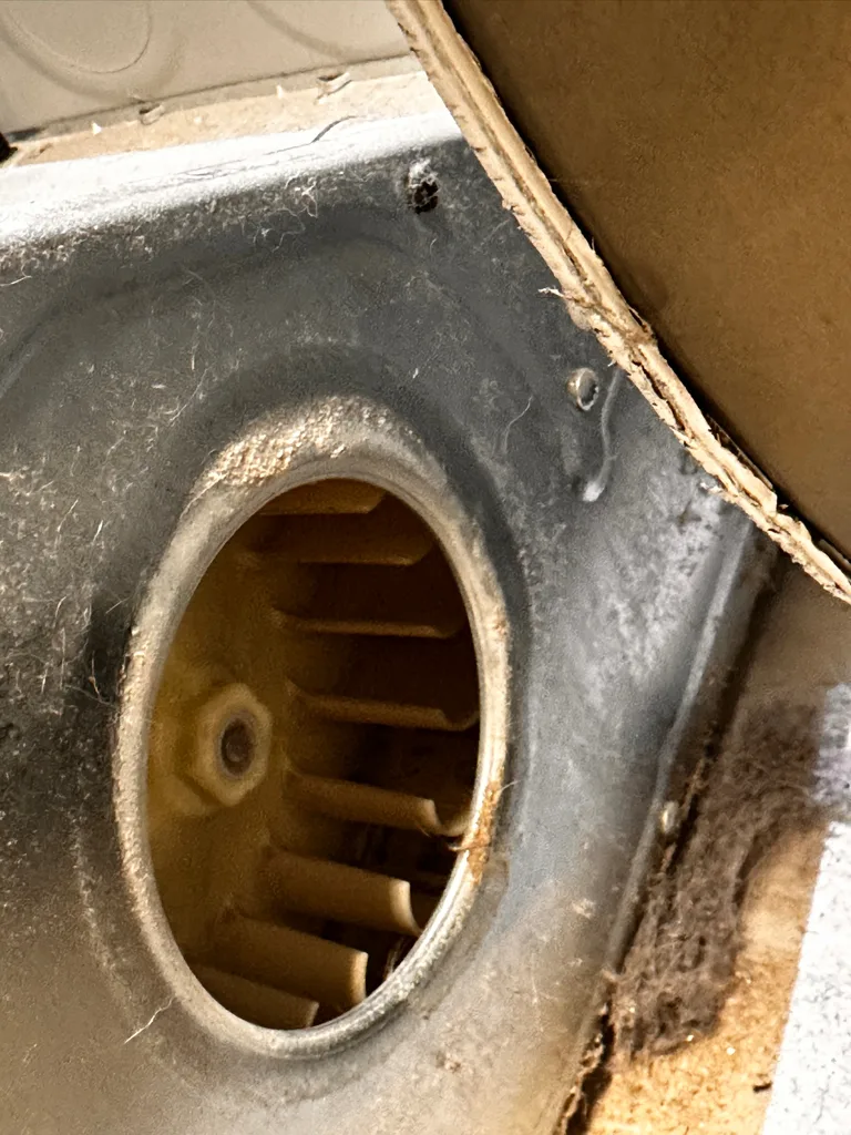 Blower housing inside a GE front-load dryer