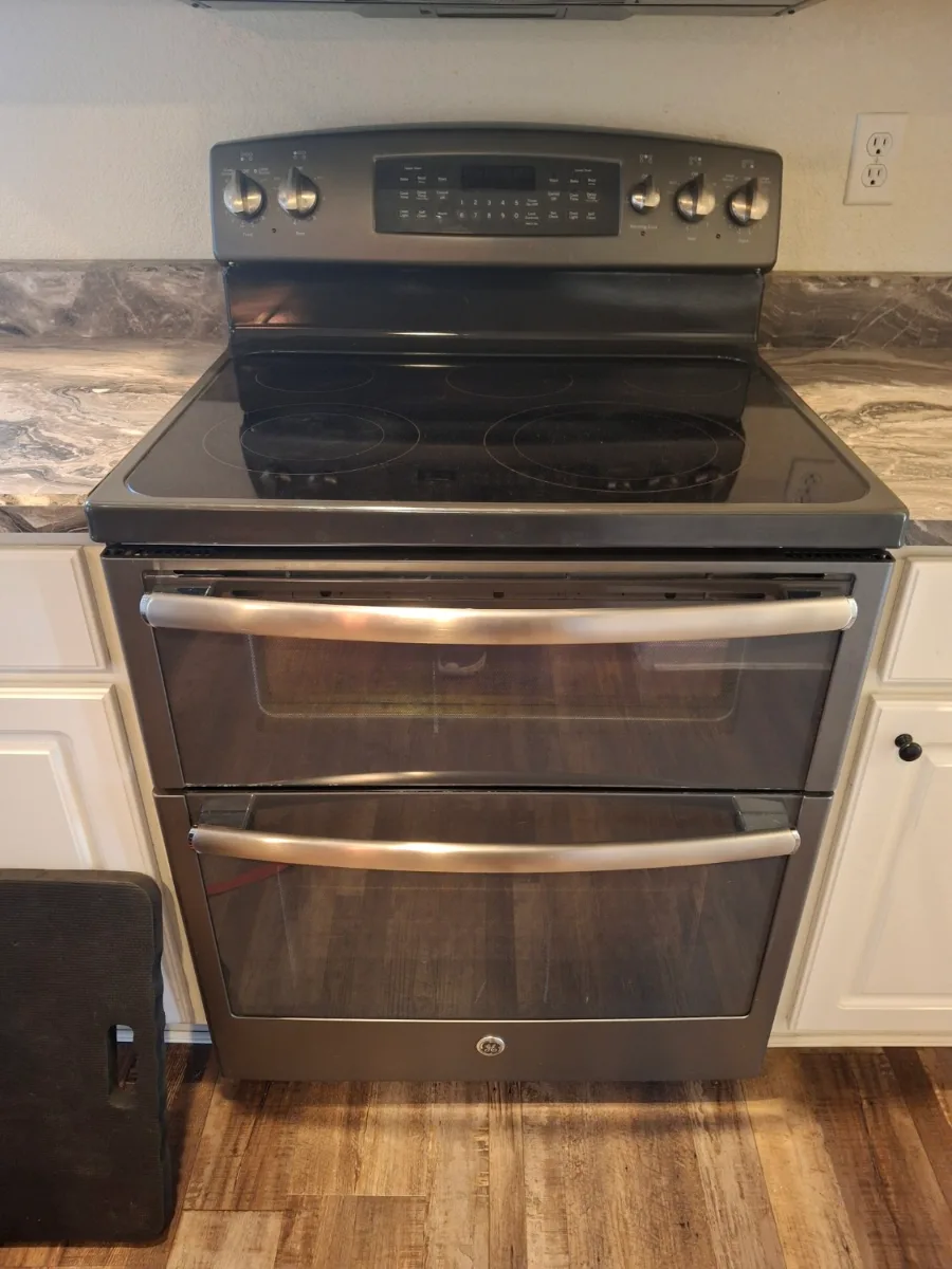 GE electric double-oven range with a glass cooktop