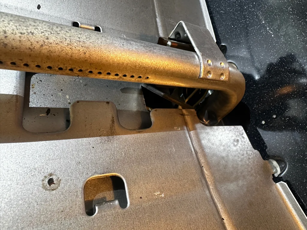Bake burner and igniter inside a GE gas range oven