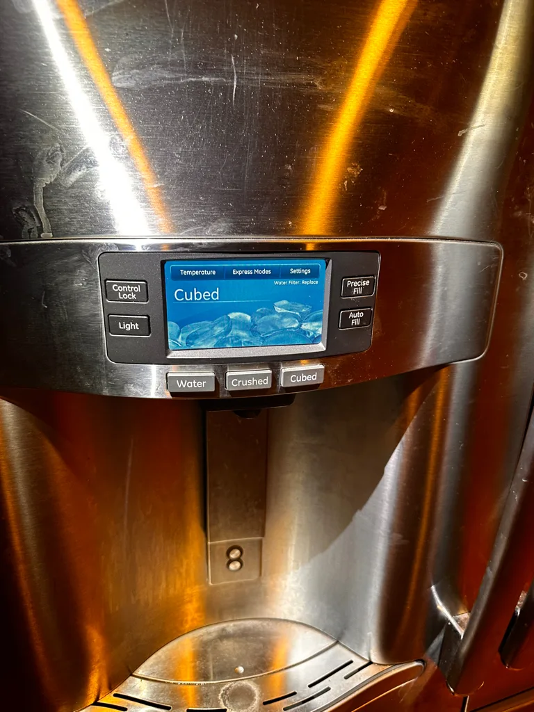 GE refrigerator dispenser control panel and display