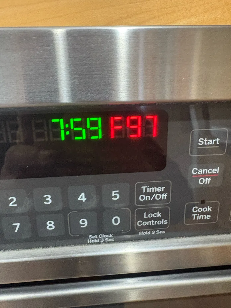 GE double wall oven control showing an F97 error