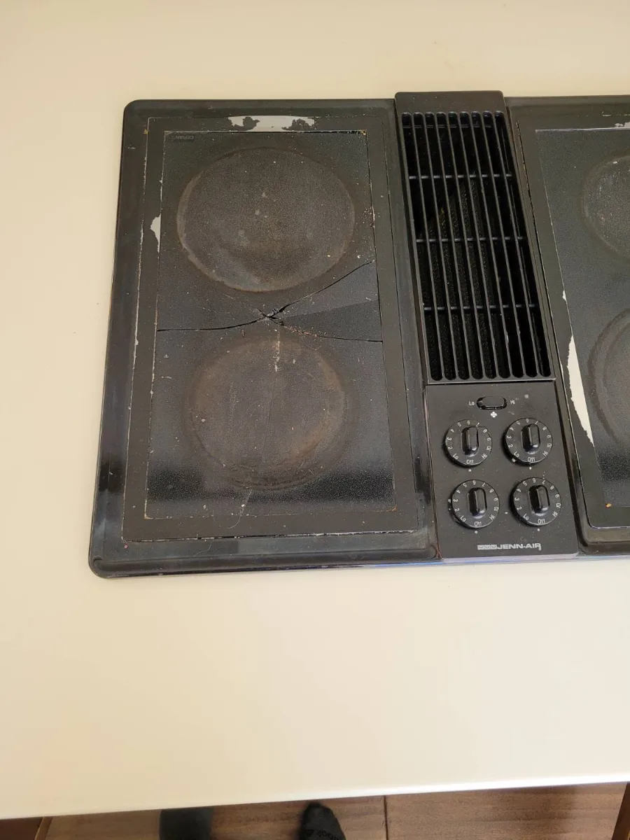 JennAir electric cooktop with a downdraft vent
