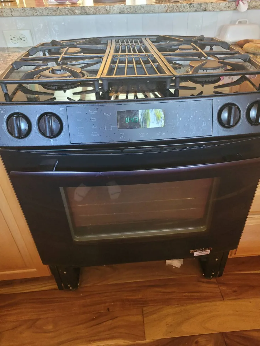 Black JennAir gas range with an oven igniter problem