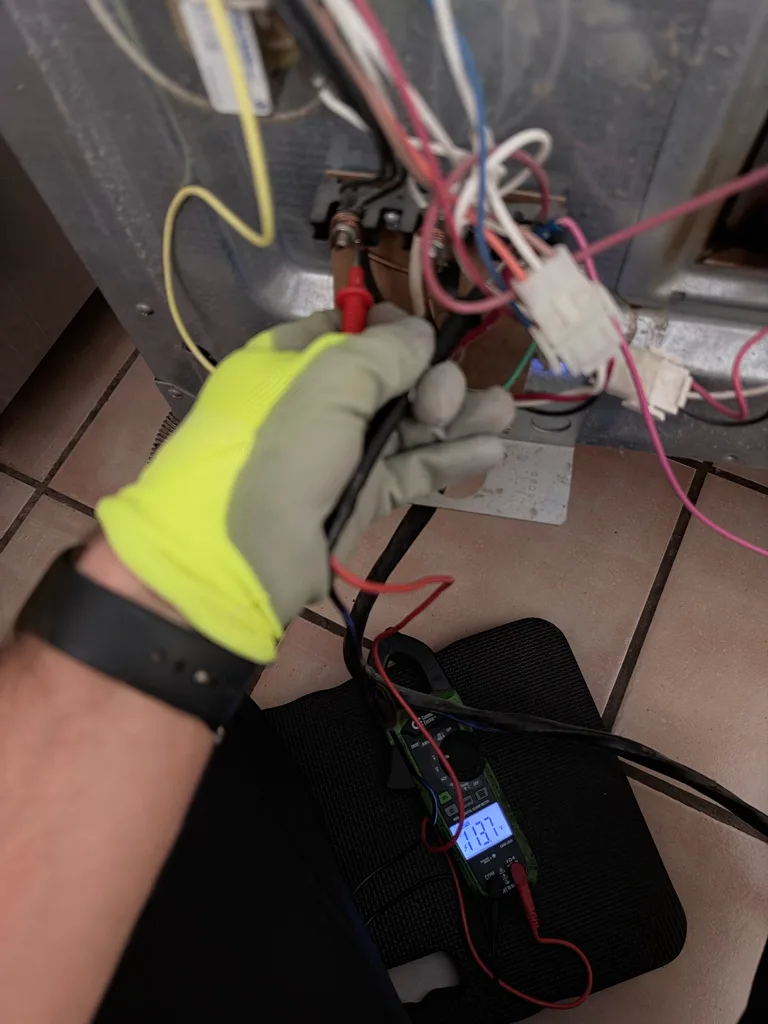 Measuring the power supply at a JennAir range