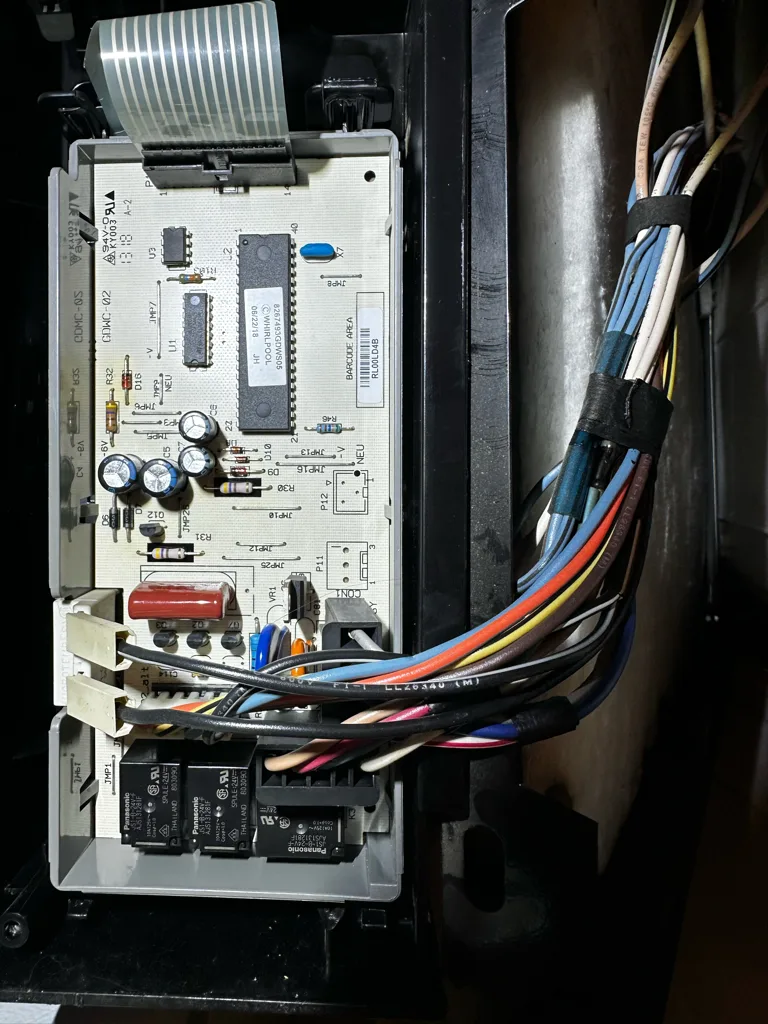 Control board in the door of a Kenmore dishwasher