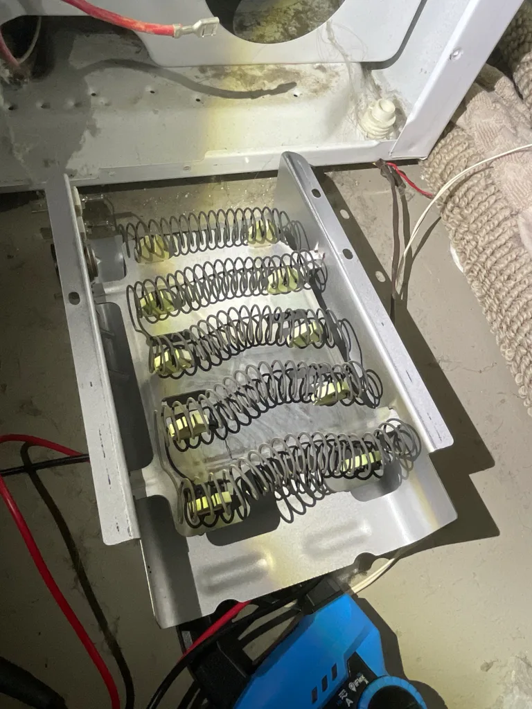 Heating element in the heater box of a Kenmore electric dryer