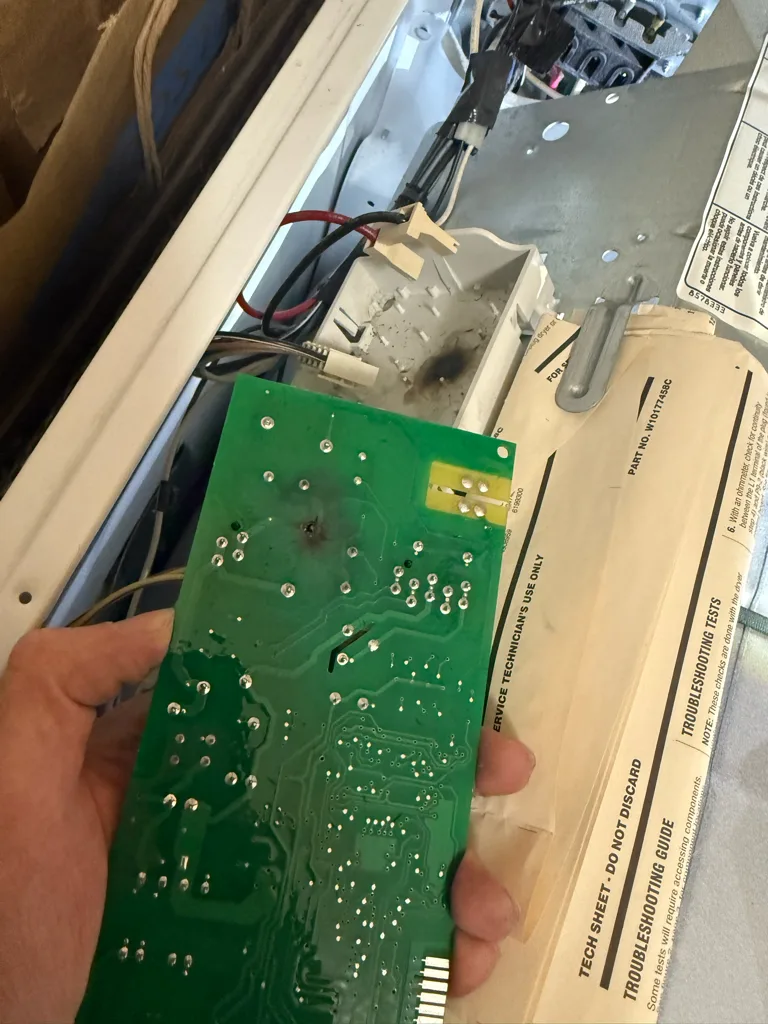 Control board removed from a Kenmore Elite dryer