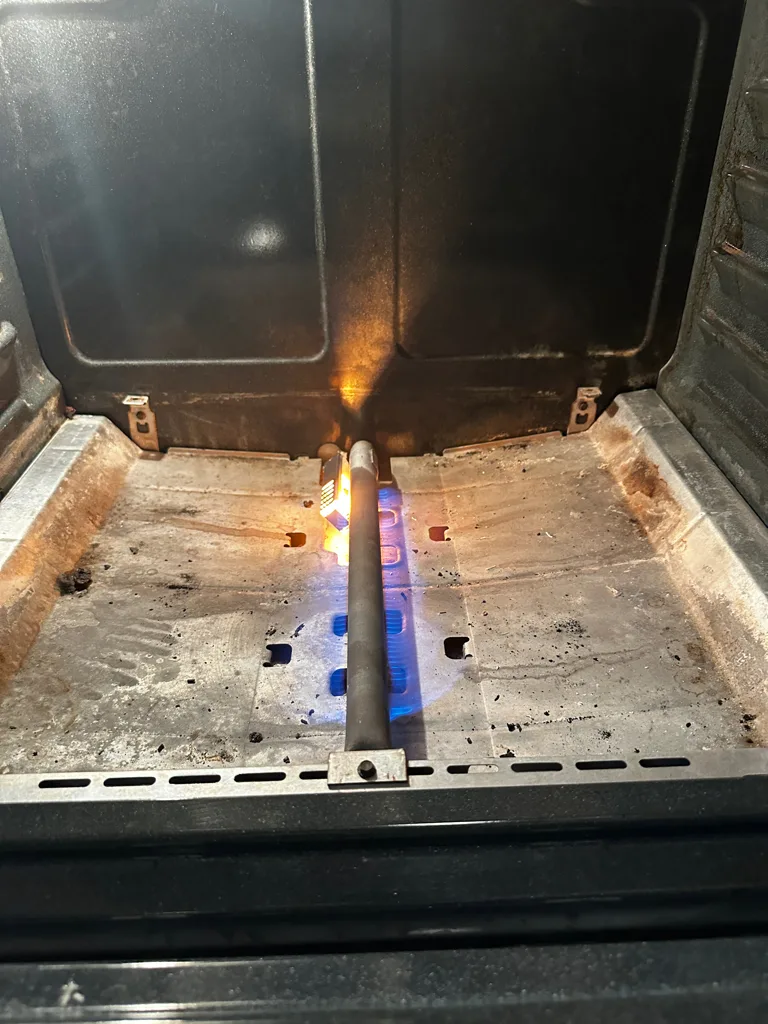 Bake burner flame inside a Kenmore gas oven