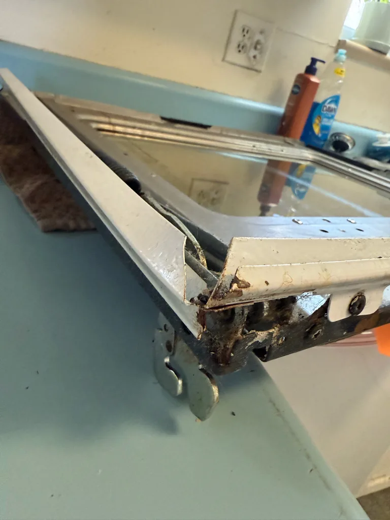 Kenmore oven door taken apart for reassembly