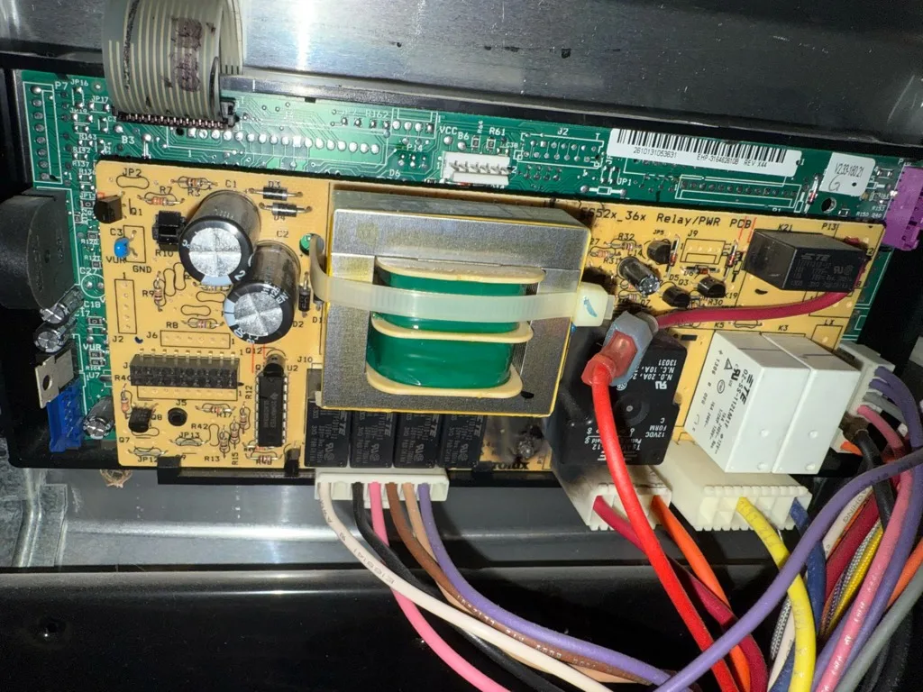 Control board of a Kenmore range that overheated with F10