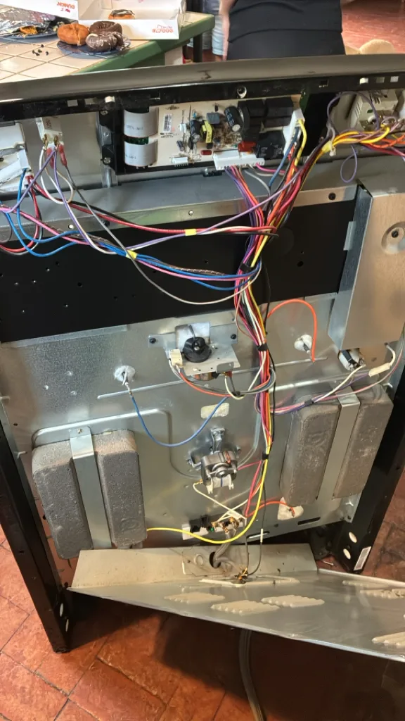 Back panel and wiring of a Kenmore electric range that was arcing
