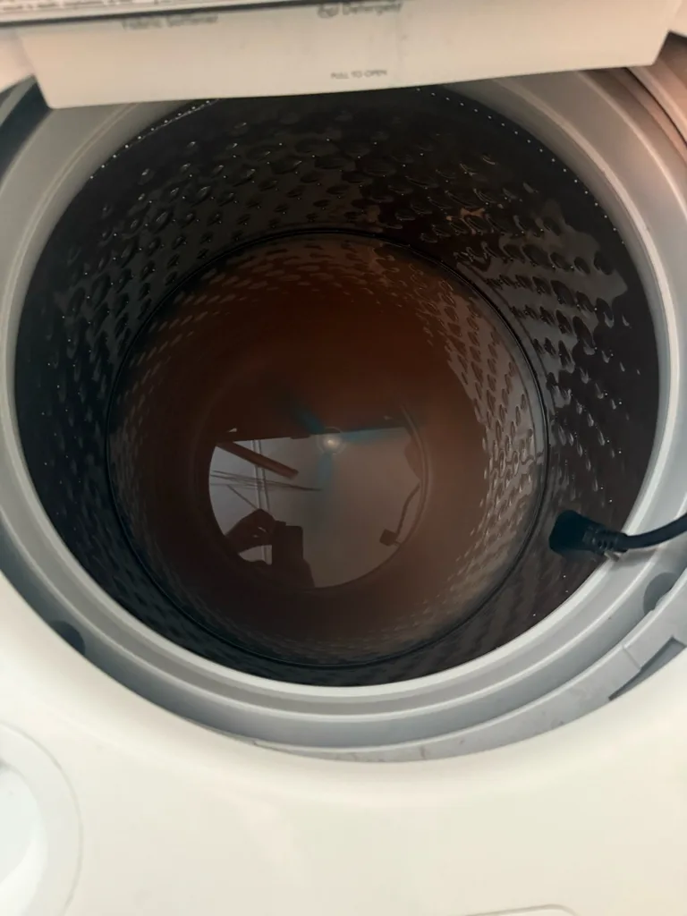 Kenmore top-load washer tub full of water that will not drain