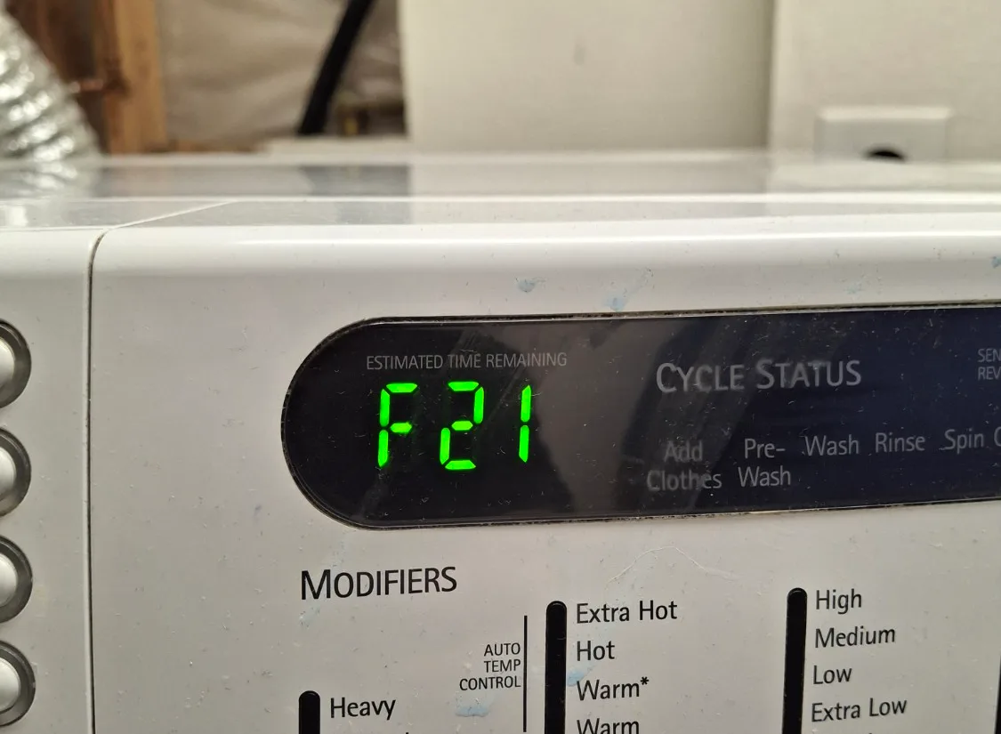 Kenmore front-load washer display showing F21