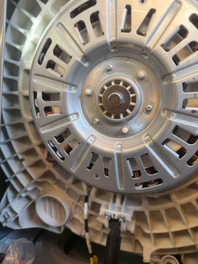 Direct-drive rotor on the back of an LG-built Kenmore washer