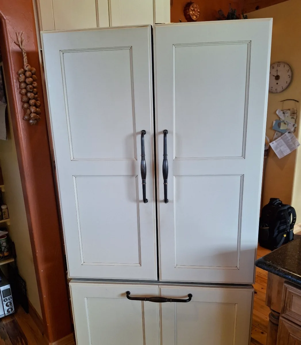 Panel-ready KitchenAid French door refrigerator with cabinet-matching doors