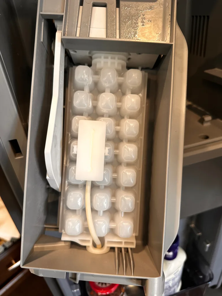 Ice maker inside the freezer door of a KitchenAid refrigerator