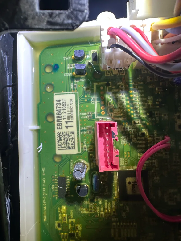 LG dishwasher main control board removed for inspection