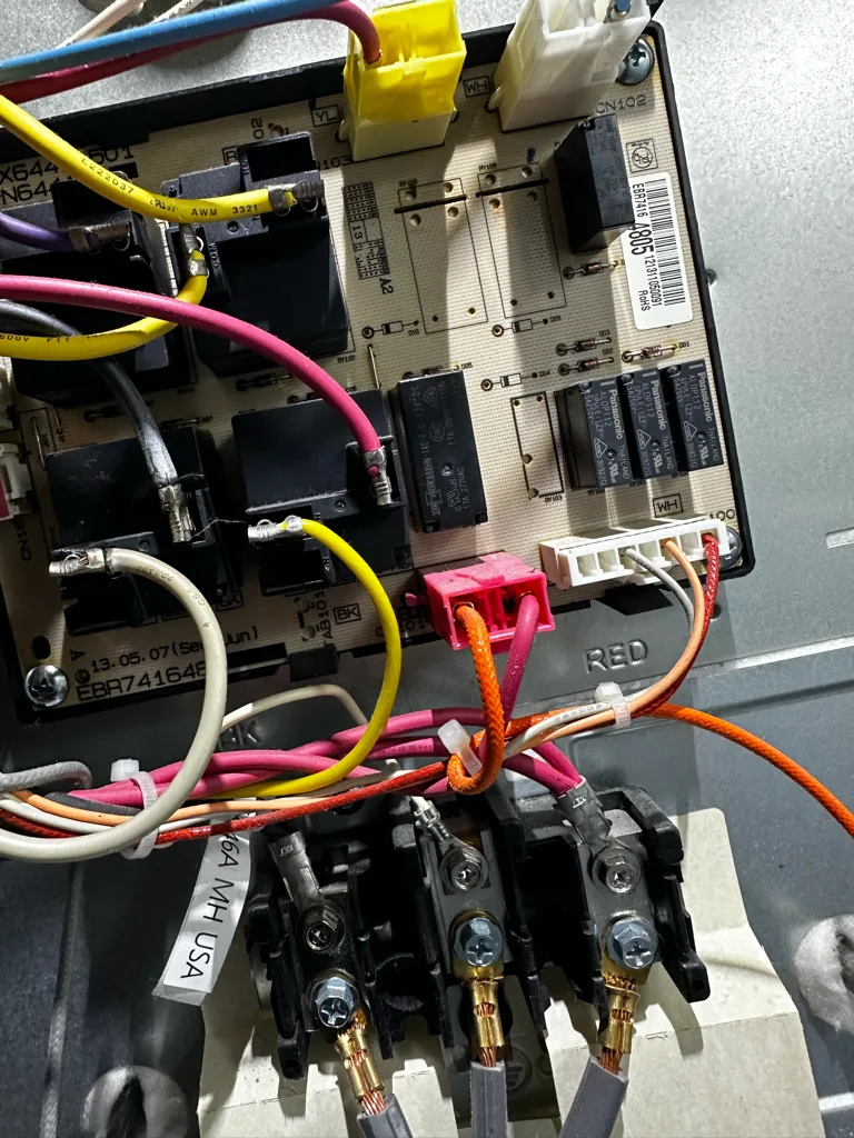 Main control and relay board inside an LG range