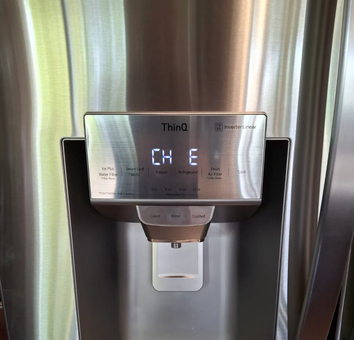 LG refrigerator dispenser display showing the CH E error code