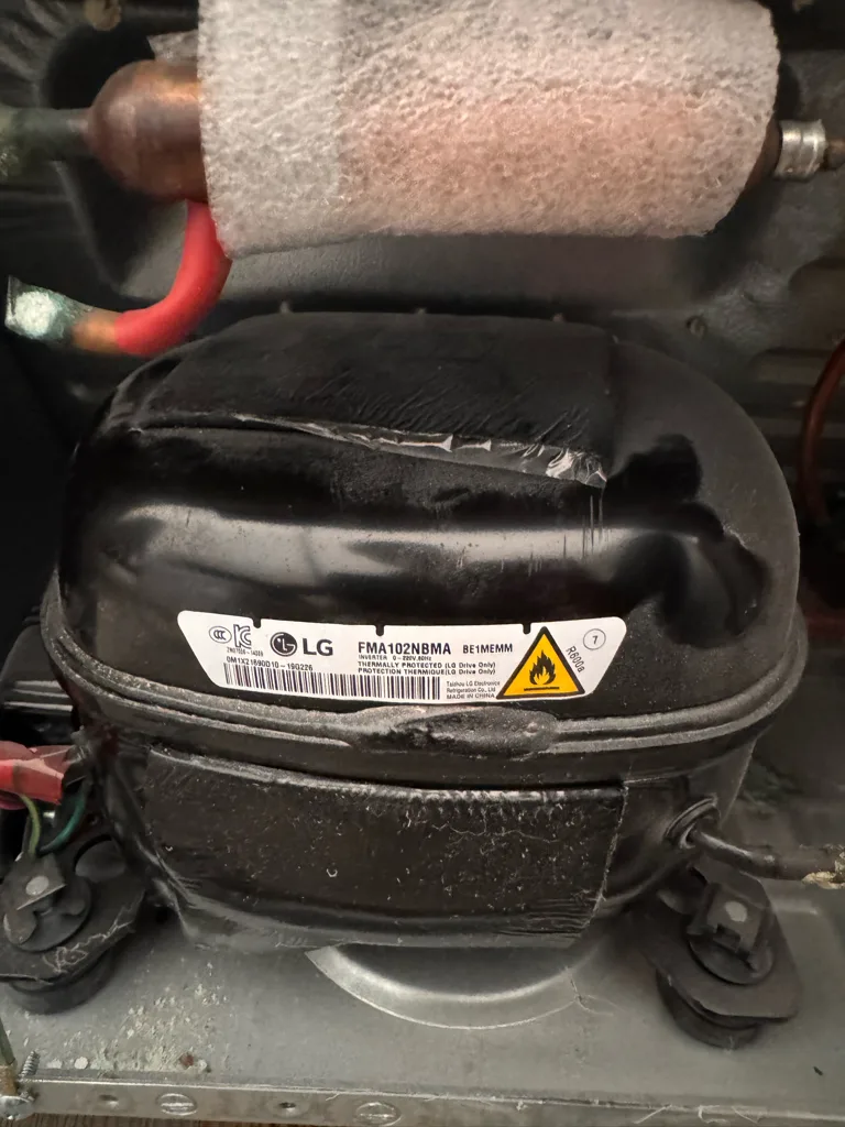 LG refrigerator compressor in the machine compartment