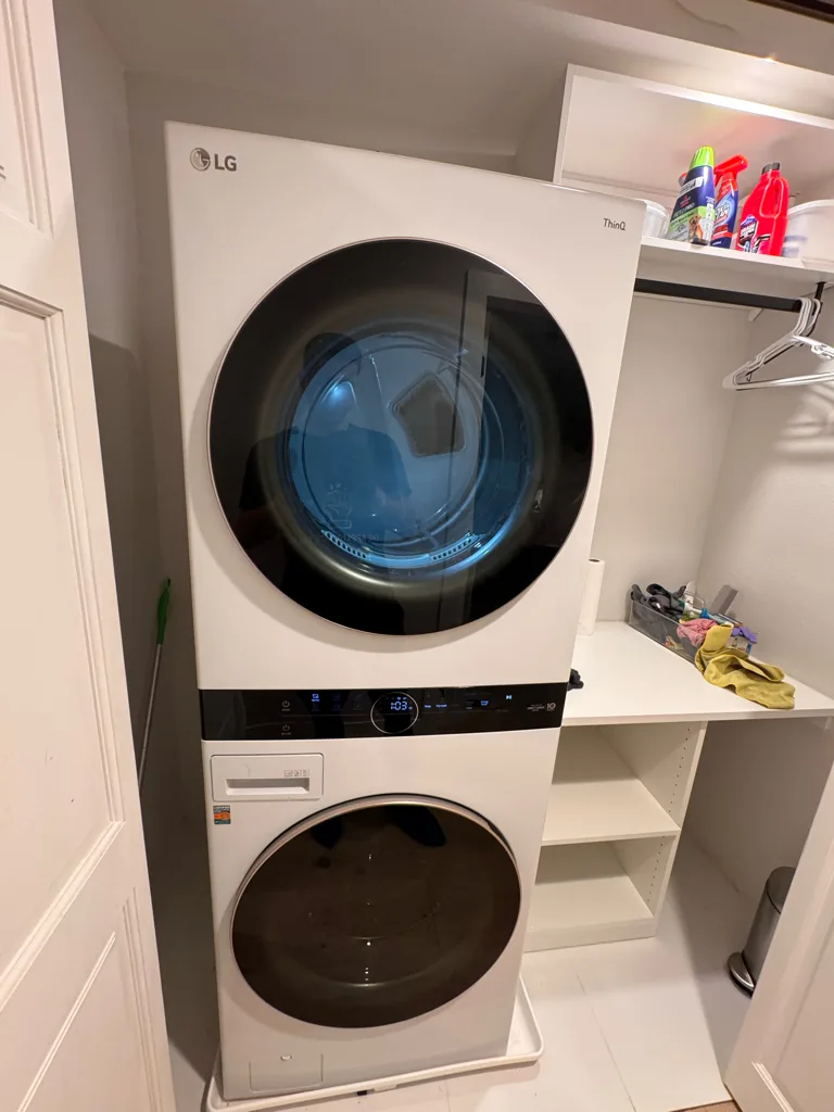 LG WashTower washer and dryer in a laundry closet