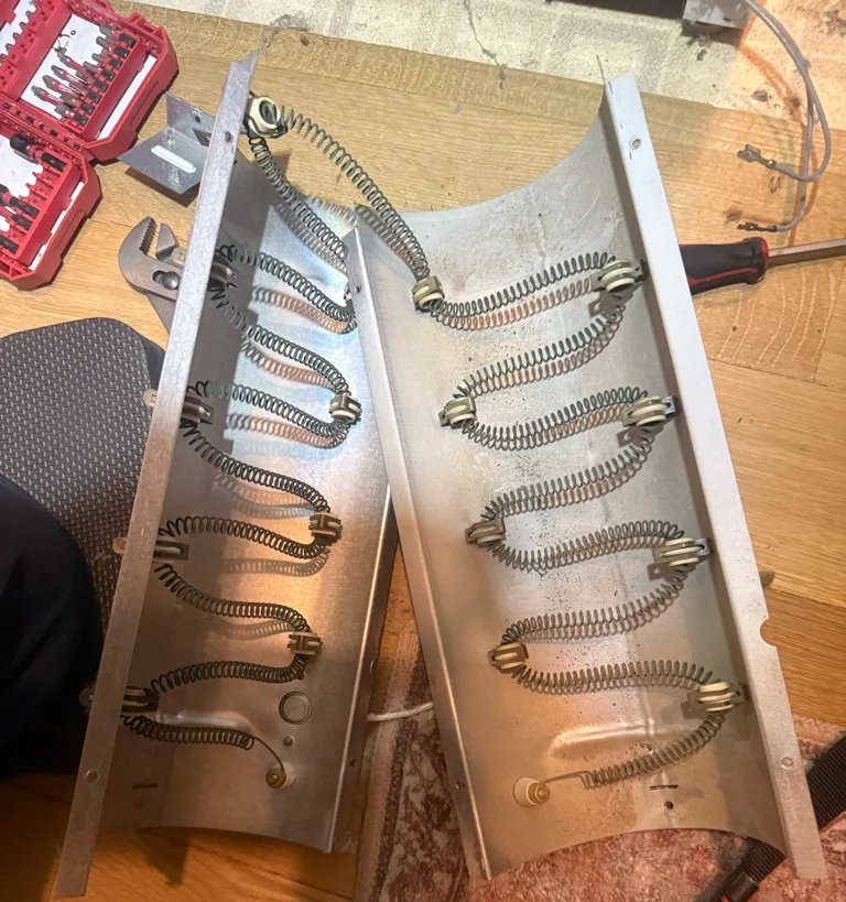 Heating element removed from a Maytag electric dryer