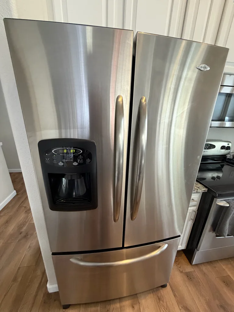 Stainless Maytag French door refrigerator in a Denver-area kitchen