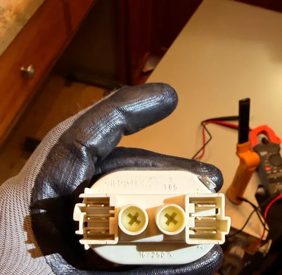 Pump part removed from a Miele dishwasher with an F14 code