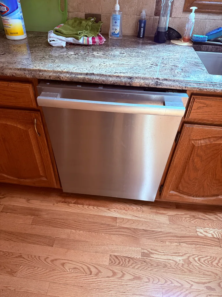 Stainless Miele dishwasher that would not drain after a new disposal