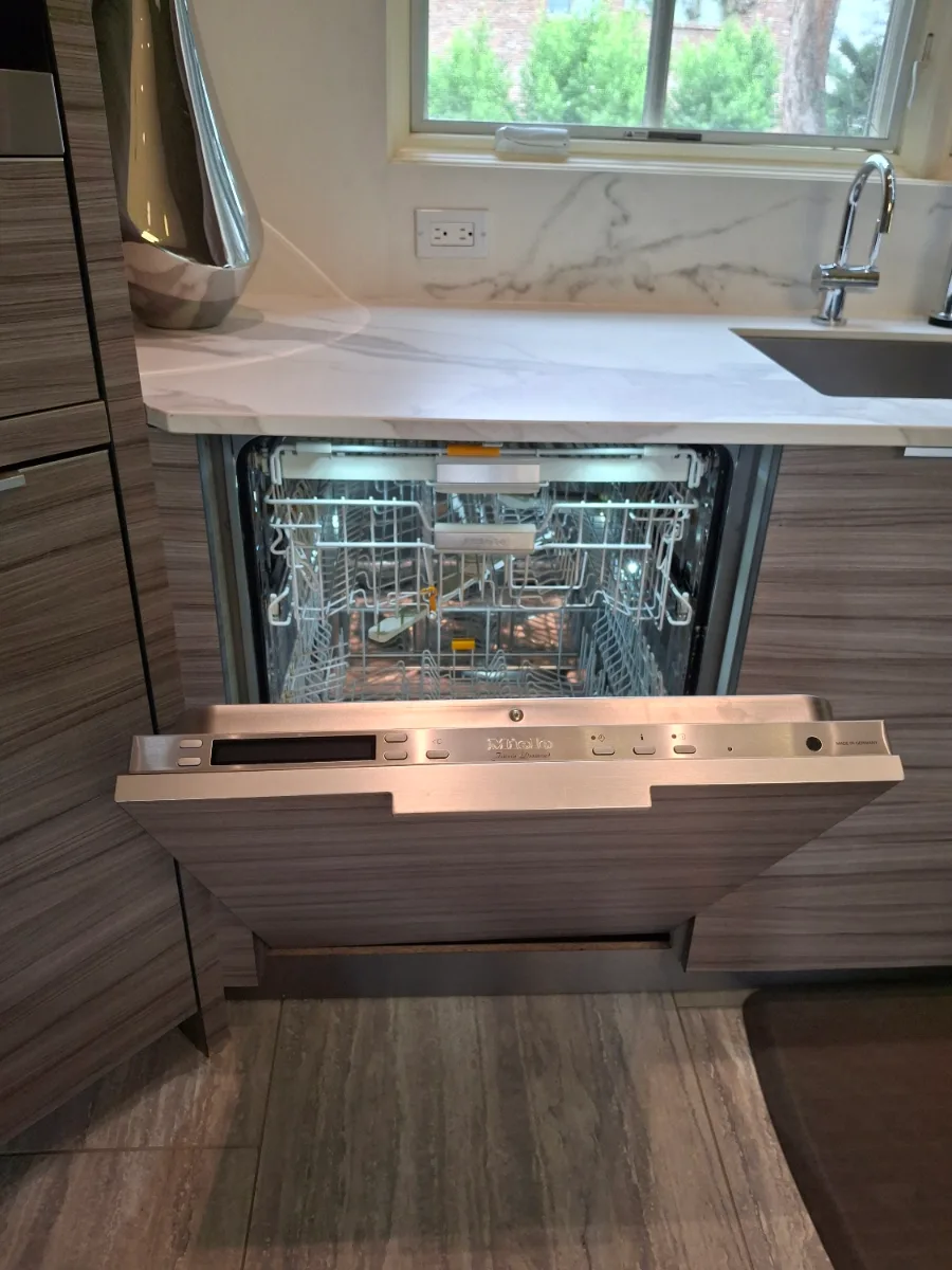 Panel-ready Miele dishwasher with a custom front