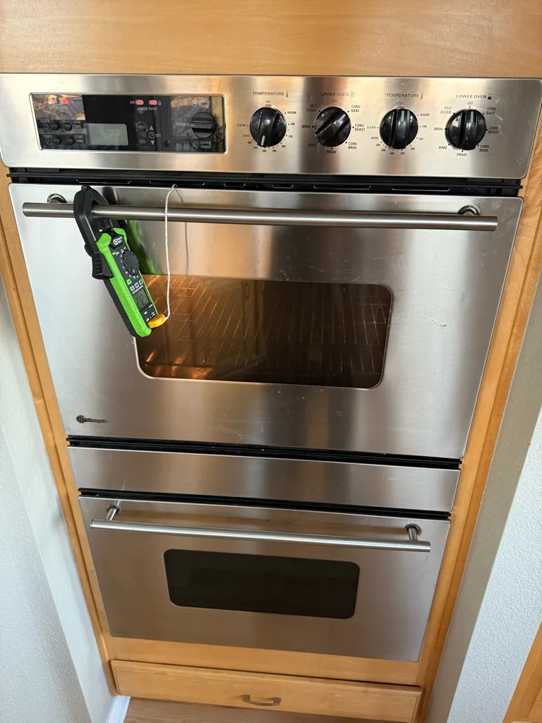 Monogram double wall oven set in wood cabinetry
