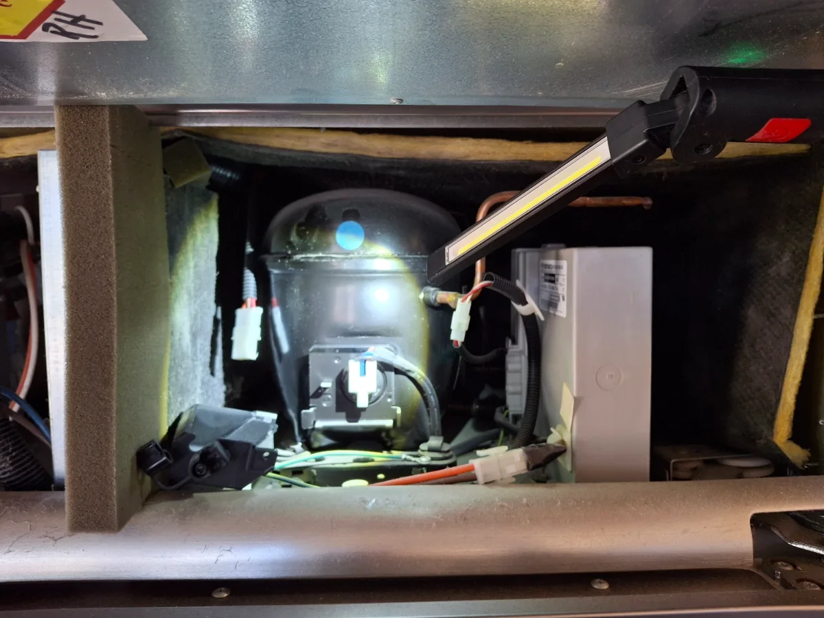 Machine compartment of a Monogram built-in refrigerator
