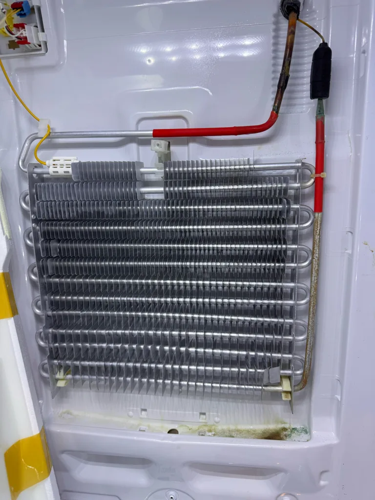 Samsung freezer evaporator and defrost heater exposed during diagnosis