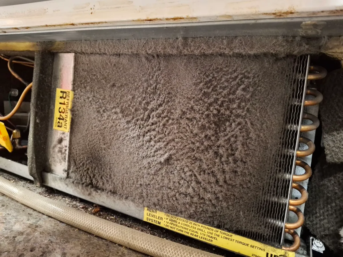Dust-packed condenser on a Sub-Zero undercounter refrigerator