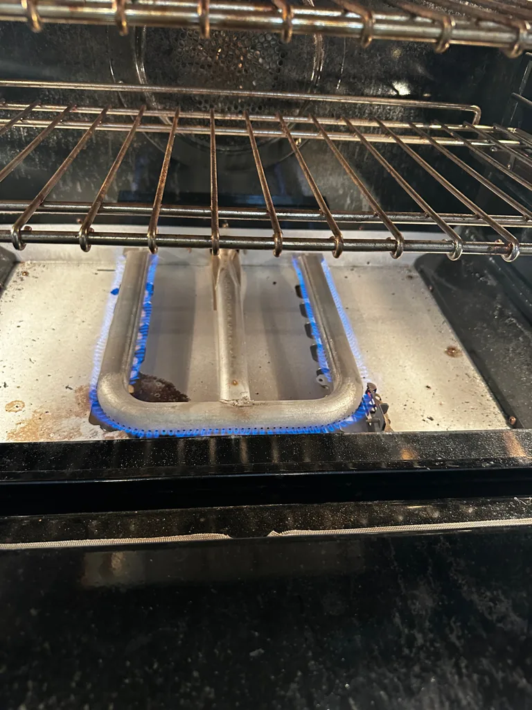 Bake burner and igniter inside a Viking gas oven