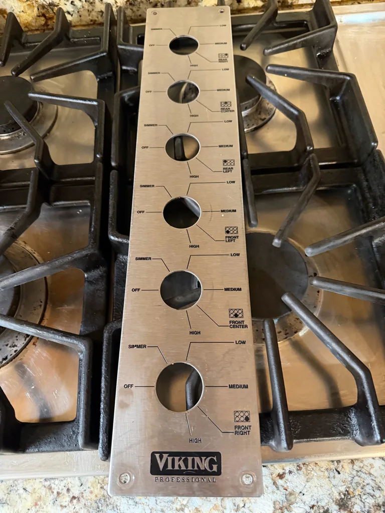 Viking rangetop burner bases and grates during a burner repair