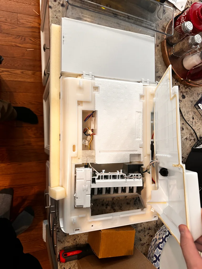 Whirlpool ice maker housing opened during diagnosis