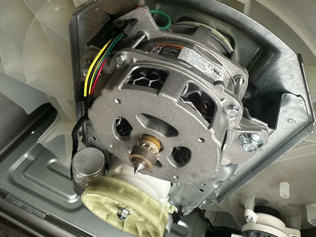 Drive motor of a Whirlpool top-load washer during replacement